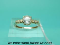 A 9ct gold ring set with cubic zirconia and diamonds (size N)