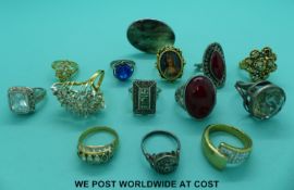 A quantity of rings including a silver set with smoky quartz, ring marked 800,