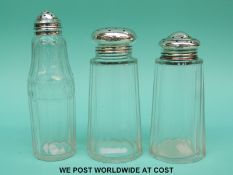 Three silver topped peppers/casters