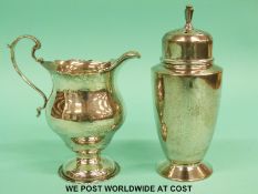 An Art Deco hallmarked silver sugar caster, Birmingham 1939, height 13.