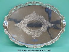 An oval two handled hallmarked silver tray, Sheffield 1901, maker James Dixon & Son,