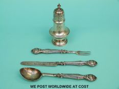 A hallmarked silver pepper, height 9.