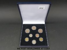 A London Mint office cased set of 20thC pre-decimal coins to include a 1946 threepence,