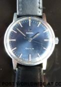 Omega gentleman's wristwatch with two tone hands and baton numerals and midnight blue face,