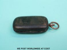 A silver sovereign holder with chequered niello decoration and import marks for Birmingham 1904