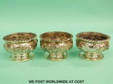 Three Victorian hallmarked silver open salts with embossed decoration, diameter 7cm, London 1891,