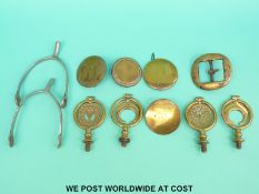 A collection of heavy/shire horse brass harness fittings and swing finials together with a pair of