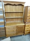 A small pine dresser with three drawers and a single cupboard (H192xW106xD46cm)