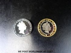 A 1999 Rugby World Cup silver proof £2 coin together with a 1996 10th European Football