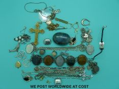 A quantity of silver jewellery to include necklaces, filigree pendant, lockets,