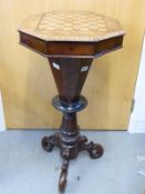 A Victorian mahogany parquetry and marquetry octagonal work table with fitted and inlaid interior