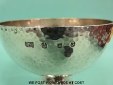 A hallmarked Scottish silver Arts and Crafts hammered pedestal bowl,
