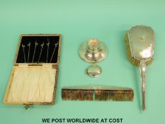 A hallmarked silver capstan inkwell,