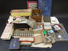 A large quantity of watch making tools, parts, books and accessories including faces, hands,