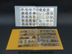 Two collectors coin folders, one containing overseas examples with small silver content,