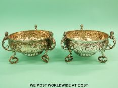 Two George V hallmarked silver bowls, raised on three feet, diameter 14cm, London 1903 and 1919,
