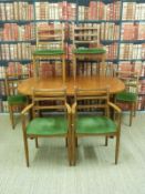 A G-Plan table (H72xL107xW153cm) with six similar chairs