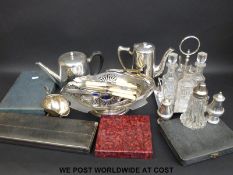 A quantity of silver plated items to include four-bottle cruet set, tea ware,