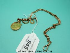 A Victorian 9ct gold Albert with two horseshoe fobs (18g) and a 1908 full sovereign fob (10g)
