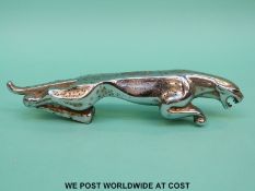 A Jaguar car mascot,