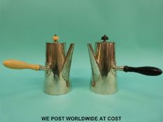 A pair of hallmarked silver hot water/chocolate pots, one with ivory mount the other hardwood,