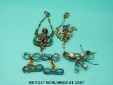 Two Austro-Hungarian pendants each set with seed pearls and enamel,