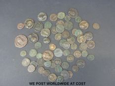 A collection of over 60 Roman bronze coins,