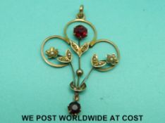 An Edwardian 9ct gold pendant in a Kemp Brothers,