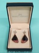 A pair of 15ct gold earrings set with rose cut diamonds and a large quartz/tourmaline section