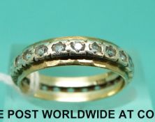 A 9ct gold eternity ring set with clear stones (size M)