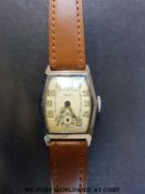Test Swiss made gentleman's wristwatch with luminous hands and numerals,