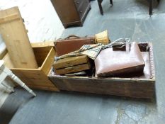 A quantity of vintage suitcases, trunks etc.