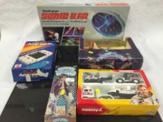 A One-to-One Astro Invader game, together with a Buddy L Nasa Space set, a Bandai Terrahawks model,