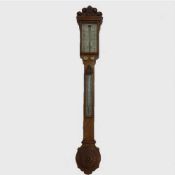 A nineteenth century carved oak stick barometer, J.