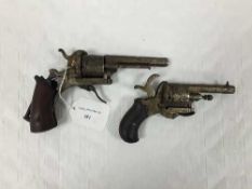 A late nineteenth century pin-fire revolver, the barrel stamped 'The Guardian Model of 1878',