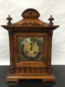 A Victorian walnut 8 day mantel clock,