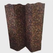 An early twentieth century four fold screen upholstered in floral fabric.