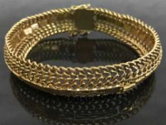 A yellow gold fancy link bracelet, marked 508, 36.7g.