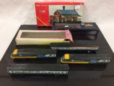 Two Hornby Railways Inter-City 125 locomotives, together with a Station Dunster, number R188,