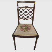 A pair of nineteenth century inlaid mahogany bedroom chairs.