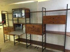 A mid twentieth century Ladderax five-bay modular storage display stand, total width 380 cm.