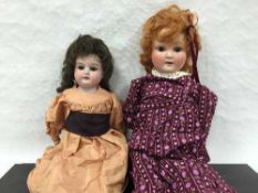 A Simon and Halbig bisque headed doll numbered 1909 7 1/2,