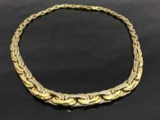 An 18ct gold fancy link graduated two-tone necklace, 27.6g.