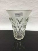 A Lalique crystal vase with petal decoration, signed R. Lalique, France, height 18.5 cm.