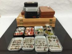 Fifteen boxes of fishing flies.