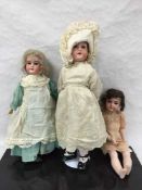 An Armand Marseille bisque headed doll with jointed limbs numbered 390 1.