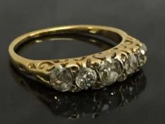 A five stone old cut diamond ring, size O.