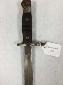 An American sword bayonet, the blade stamped Remington 1913, steel mounted leather scabbard.