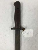A British 1907 pattern bayonet, by Wilkinson, steel mounted leather scabbard.