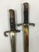 An Austrian Werndyl model 1867/73 sword bayonet, recurving blade,